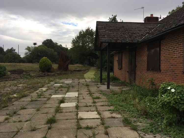 The dilapidated clubhouse at the former golf course.