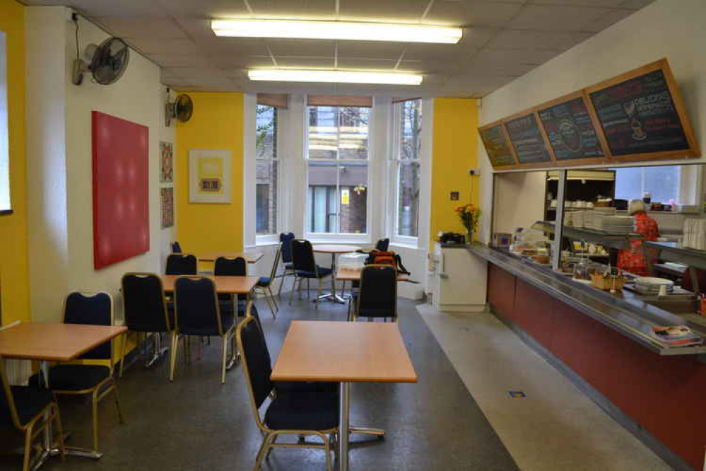 The cafe is painted in bright, cheerful colours.