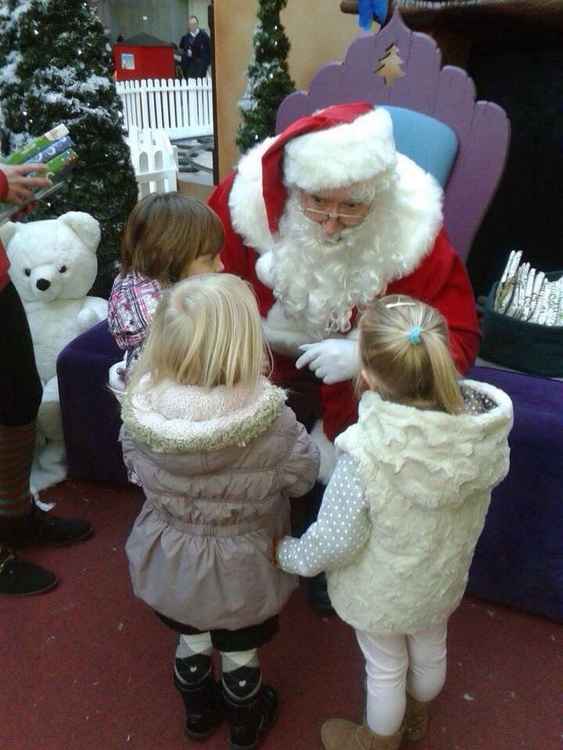 John with three young visitors last year, before social distancing was introduced.