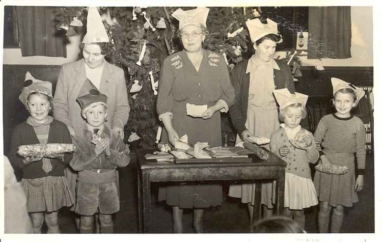 Christmas presents and a Christmas show organised by Ockford-Godalming WI, probably during or just after the Second World War.