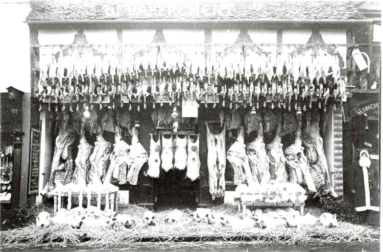 The display of Christmas stock at Parfrements butchers in the HIgh Street. Look for Father Christmas on the right.