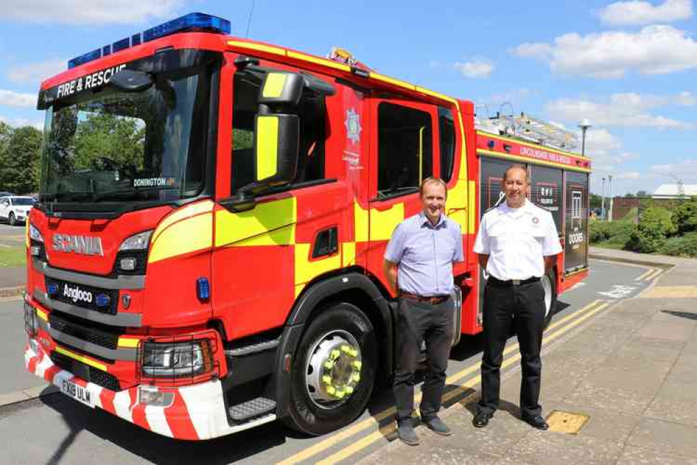 Chief Fire Officer Les Britzman and county councillor Nick Worth with the first of the new fire appliances
