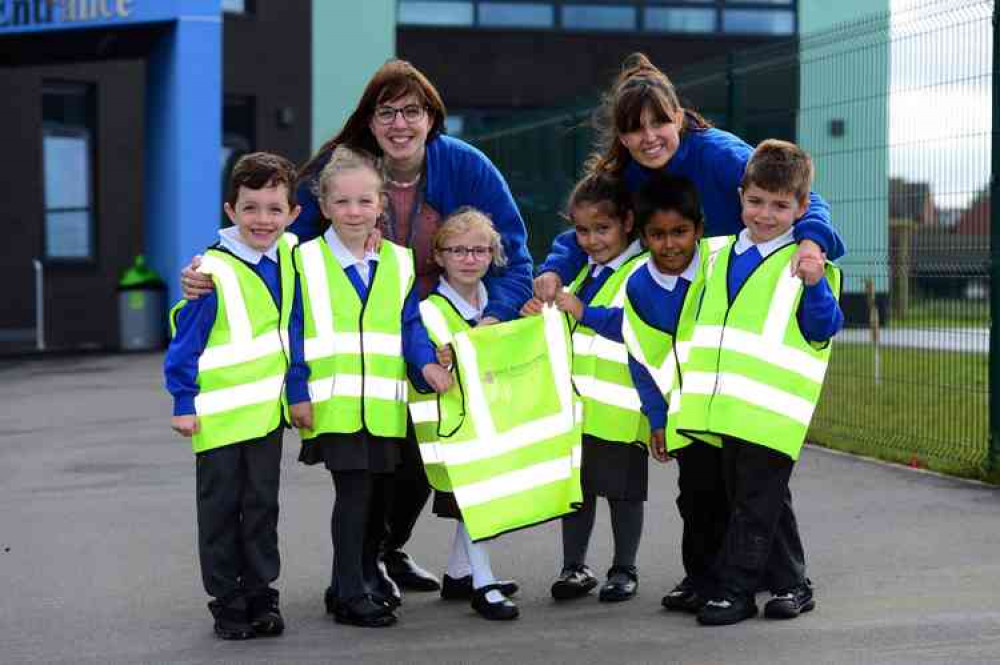 Poplar Farm Primary School pupils and staff members Lucinda Thorpe and Becky Smith