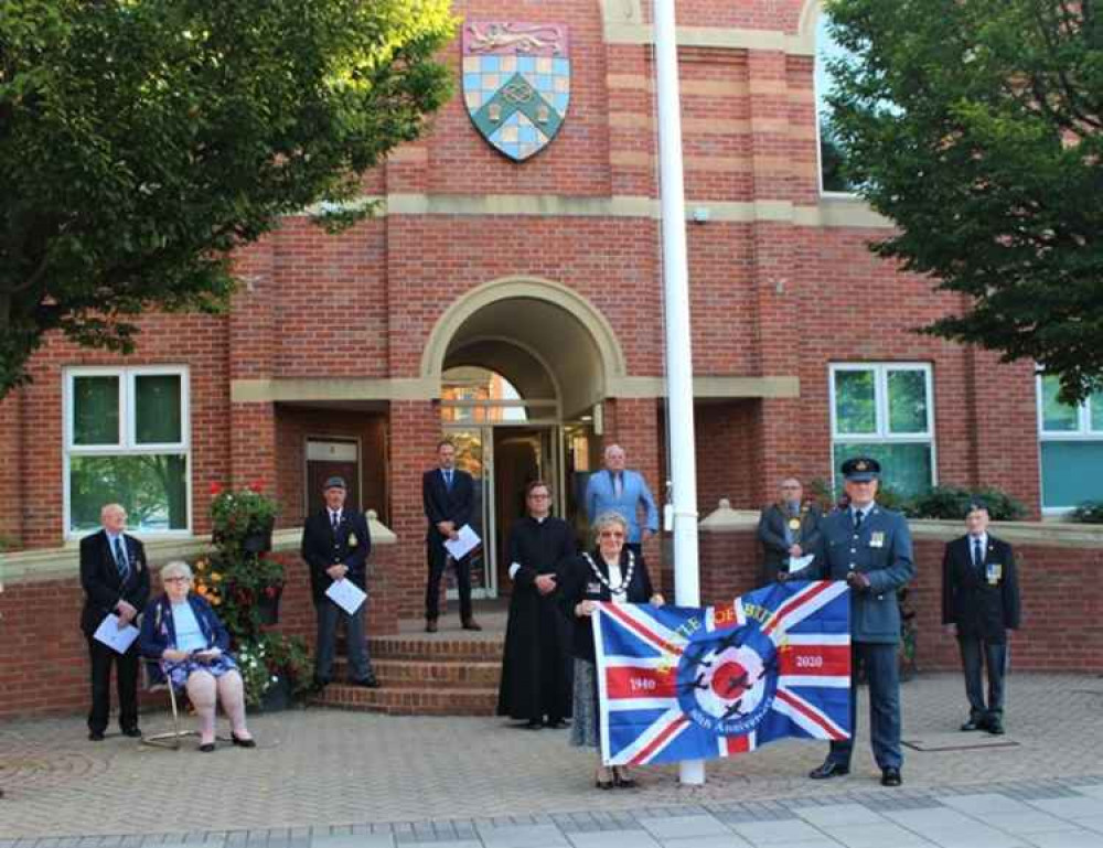 Pictured (l-r)  John and Grace Knightall of the Royal British Legion, Cllr Dean Ward, SKDC Director of Finance (Interim) Richard Wyles, Fr Stuart Cradduck, Cllr Barry Dobson, Cllr Adam Stokes, Cllr George Chivers,  Cllr Jacky Smith and Flt Lt Andy Cutts