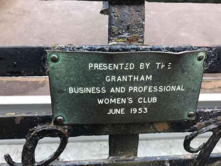 The women's club bench before restoration