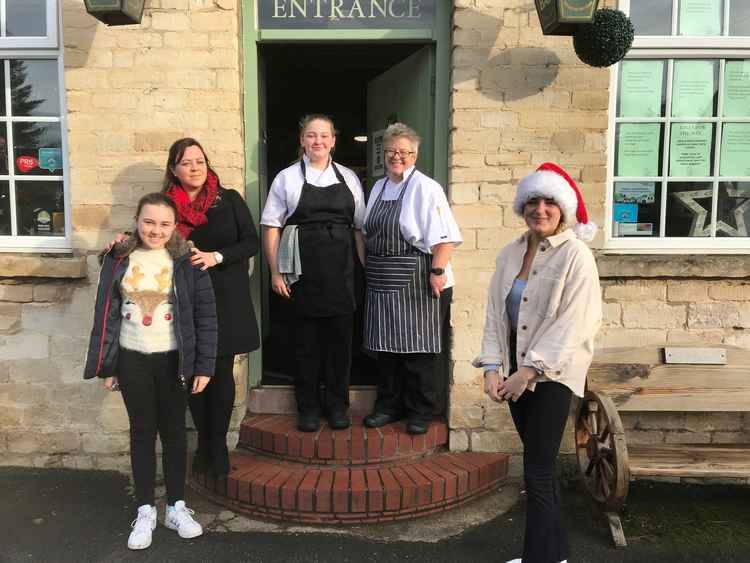 Green Man staff Emma and Faith Vickers, Leanne Docherty, daughter Ebony and Ruby Johnson