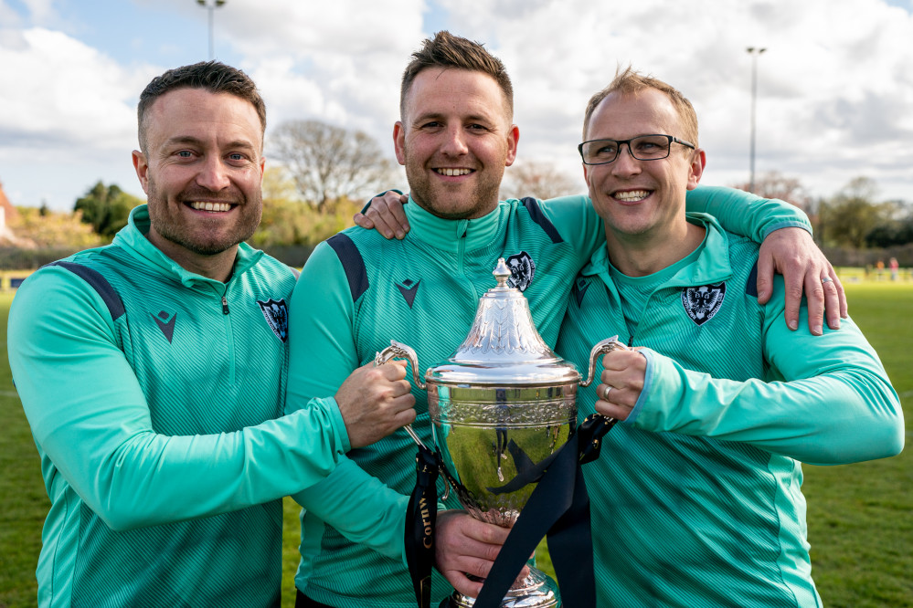 Double delight for Falmouth. Gaffer Andrew Westgarth holds the Senior Cup. Credit: Patrick Tod/Cornwall Sports Media.