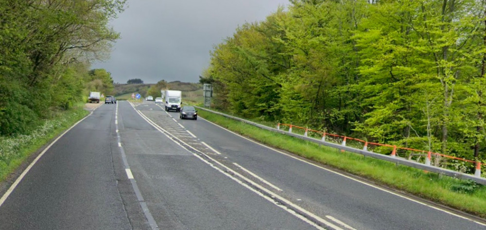 Two vehicles have crashed near the village, blocking the road and causing long delays between Bridport and Charmouth (Image: Google Maps)