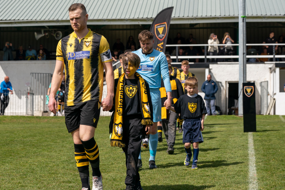 Captain James Ward leads the team out at Poltair Park. Credit: Patrick Tod/Cornwall Sports Media.