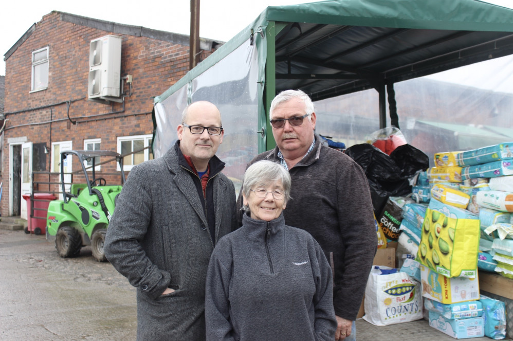 Mark Bailey spoke to Congleton Nub News about the most-requested items for our town's Ukrainian donation point. Here he is pictured with his mum Lynn and fellow Rotarian Rob Lomas of Glebe Farm. (Image - Alexander Greensmith)