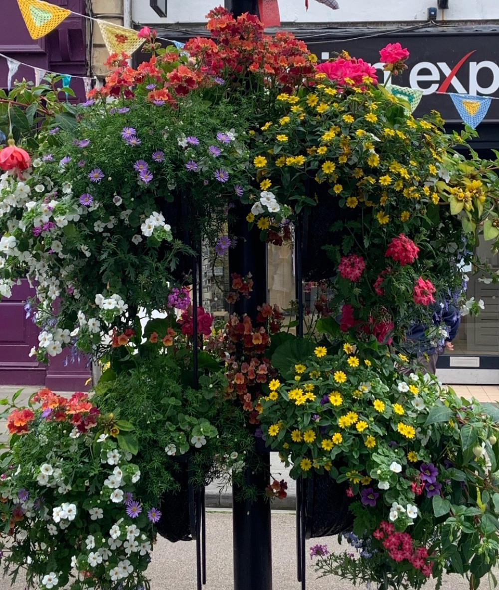 A Wells in Bloom display brightens the High Street in 2019. Photo: Philip Welch