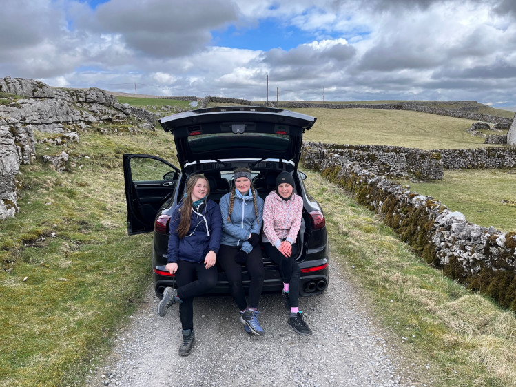 Charlotte Clark, Emma Shaw and Amelie Buzzard at the end of the Three Peaks!