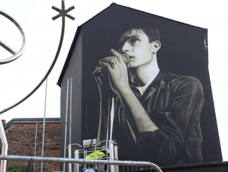 Relive the creation of the Macclesfield Ian Curtis mural - on 86 Mill Street - with this breathtaking video. 