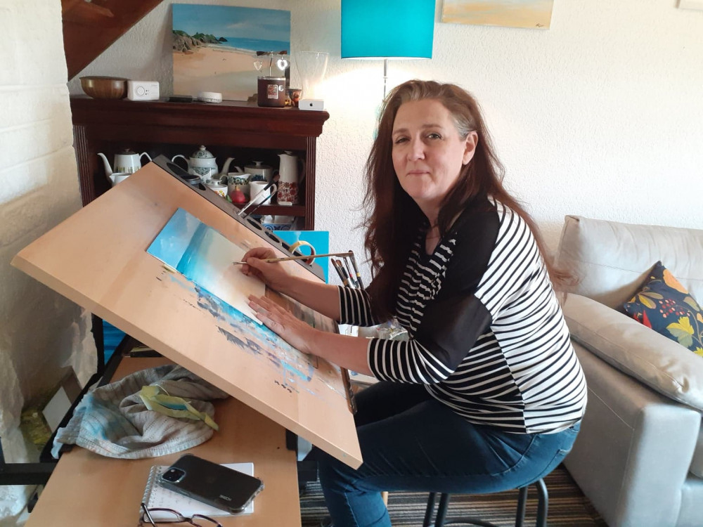 Lisa Joli at work on her latest seascape from her Haslington home.
