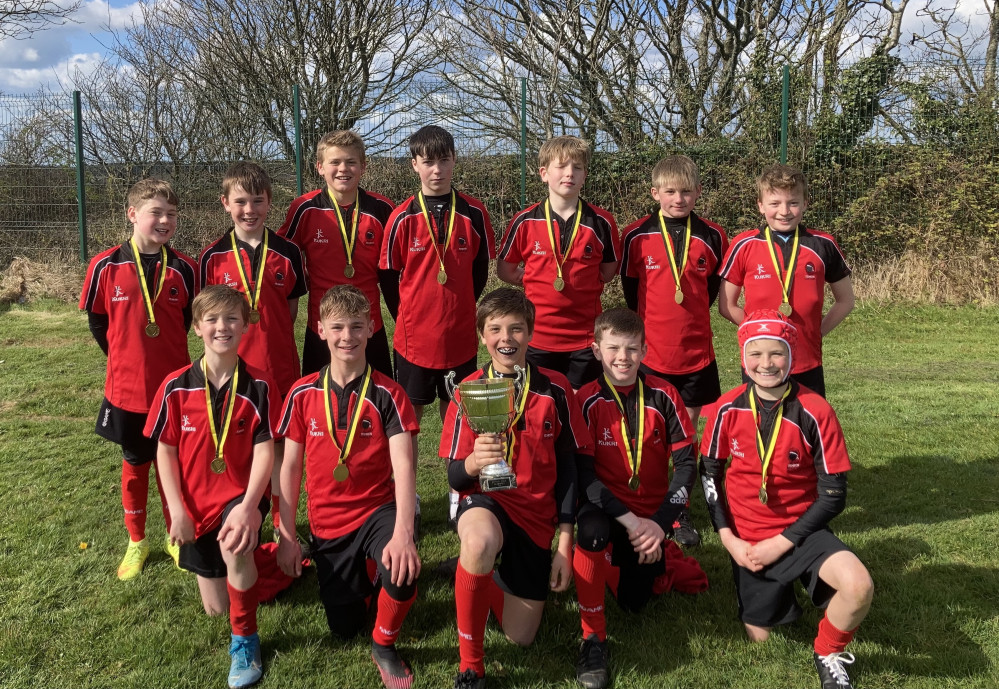 Penryn College Year 7 rugby team celebrate their victory. 