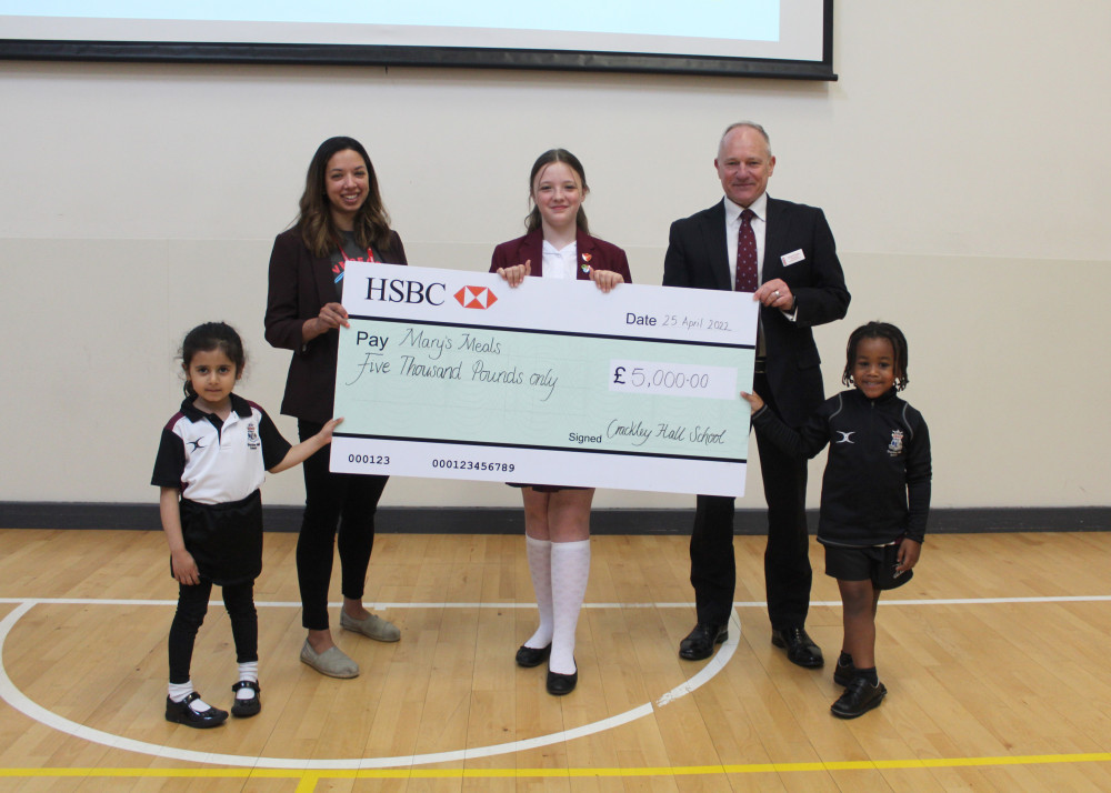 The cheque was presented by Rob Duigan, Headmaster and pupils Lily, Marley and Nirvair