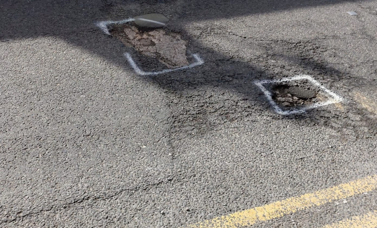 Macclesfield: Two potholes on Chestergate this month. 
