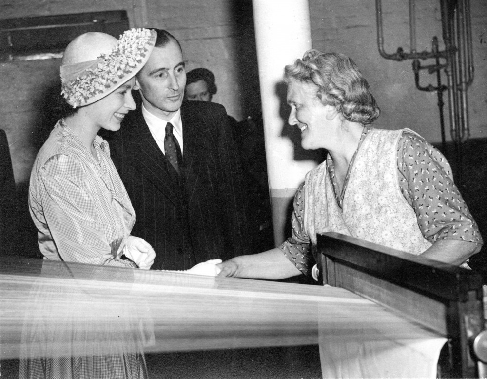 Queen Elizabeth II - then Princess Elizabeth - inside Hurdsfield Mills (BWA) on a visit in to Macclesfield in the late 1940s. (Image Credit - Macclesfield Museums)