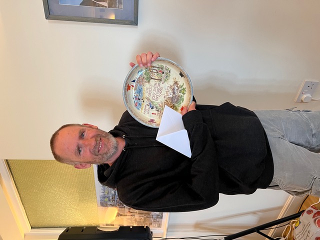 Outgoing Grizzly race director Tony Smith with a memento of his five Grizzly events