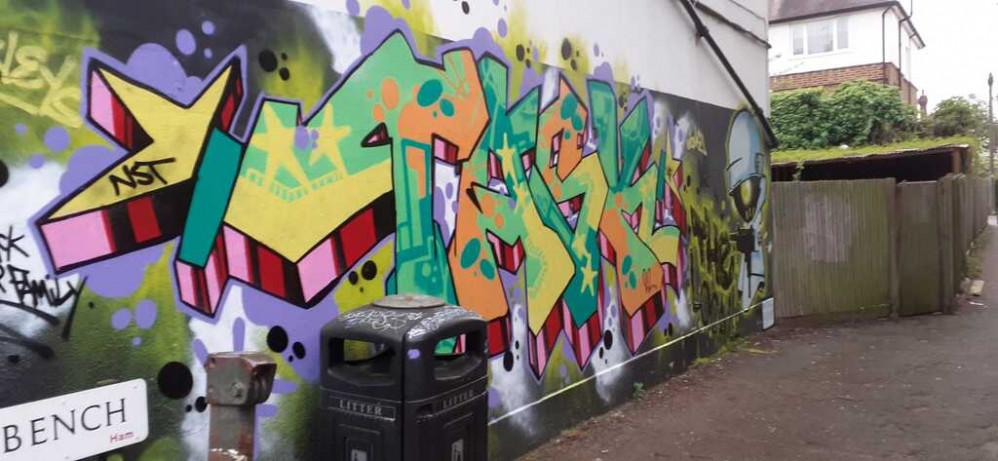 Newly painted graffiti covering a large section of wall in Ham has set residents against each other with questions over whether it should be seen as art or vandalism.