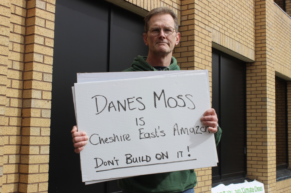 Macclesfield: Almost 1000 homes are being planned on the fringes of the Danes Moss Nature reserve, which protestor Richard's sign described as 'Cheshire East's Amazon'. (Image - Alexander Greensmith / Macclesfield Nub News) 