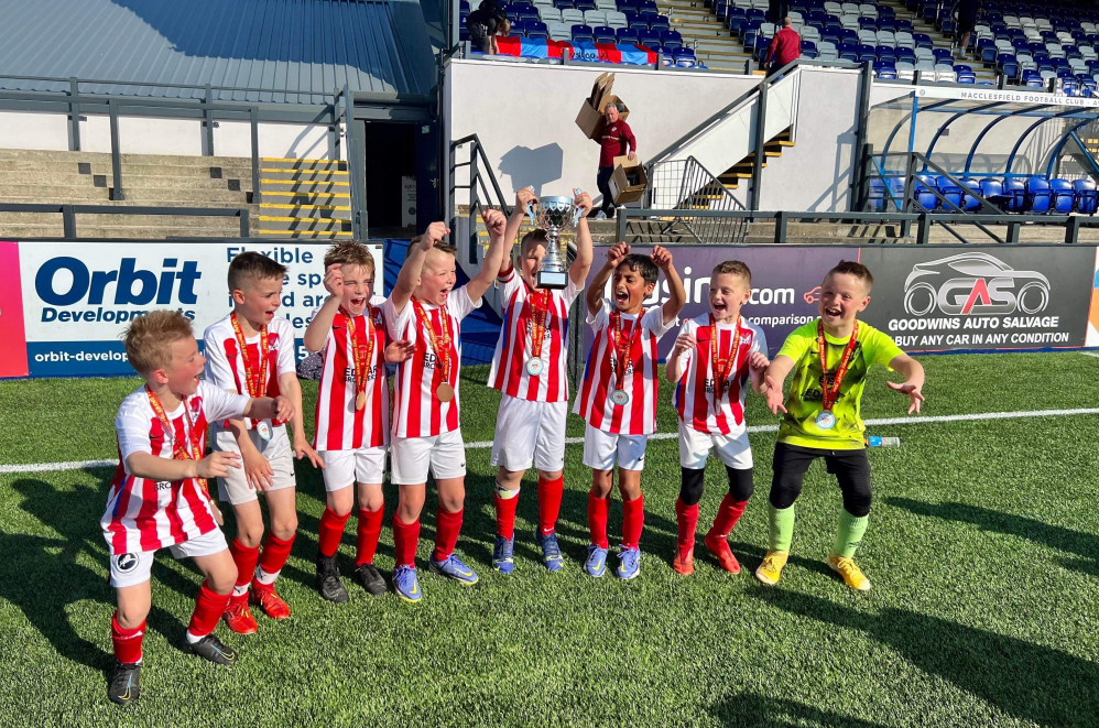 Tytherington Juniors FC Under 8's had the honour of playing on Macclesfield's FC ground, and they then won the trophy in an emphatic victory. (Image - Tytherington Juniors FC)