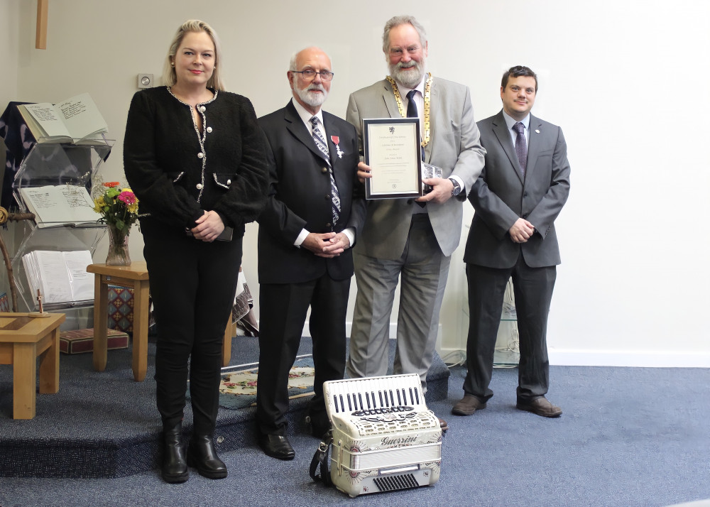 Macclesfield Town Clerk Laura Smith (left), accordionist and fundraising hero John Jones MBE (centre), Macclesfield Mayor David Edwardes ready to present John's awards (centre-right), and Cllr Chris Willcock. (Image - Macclesfield Nub News / Alexander Greensmith)