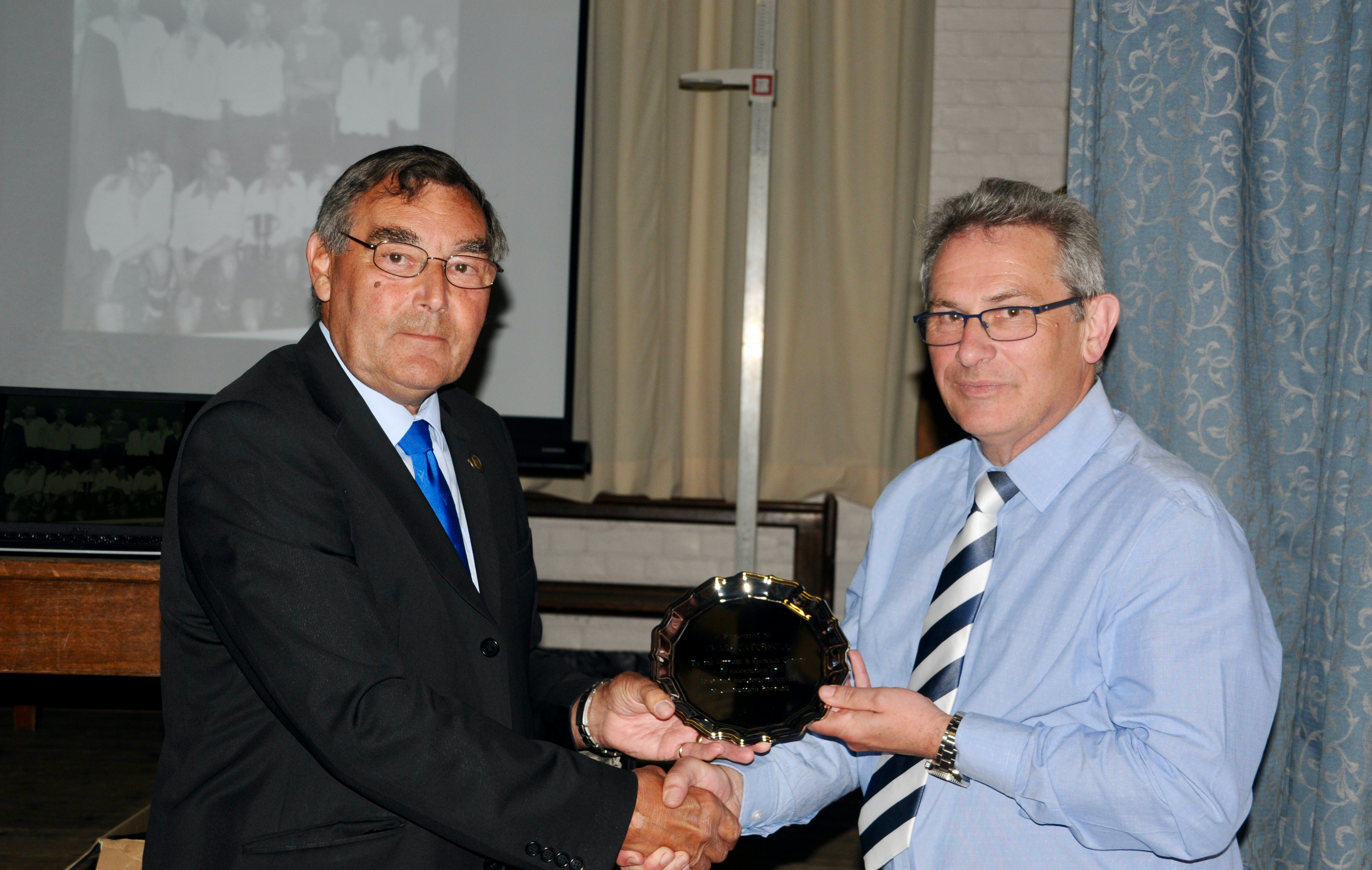 Craig Catchpole gets his SIL Long service award from Keith Norton (Picture credit: Shotley peninsula Nub News)