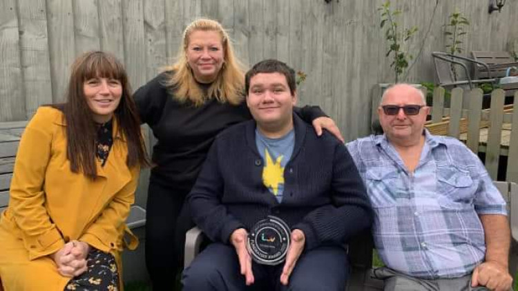 Sam Turner, with (from left) his PA Mel Clark, mum Jacky and dad Barry. 