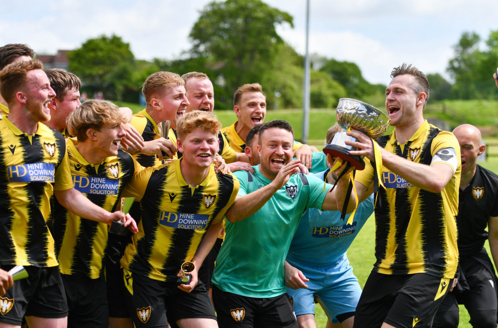 Falmouth Town FC celebrate winning Champions Bowl. 