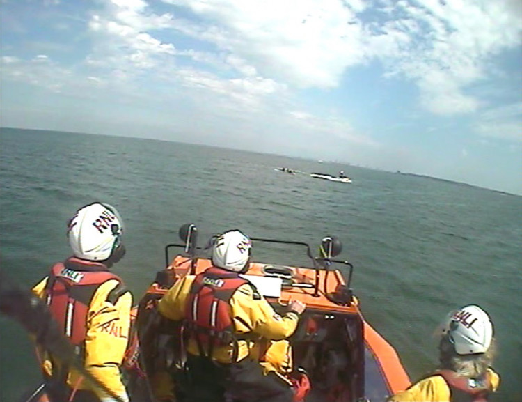 The paddle boarders had been swept offshore by the wind and tide - Picture: Hoylake RNLI