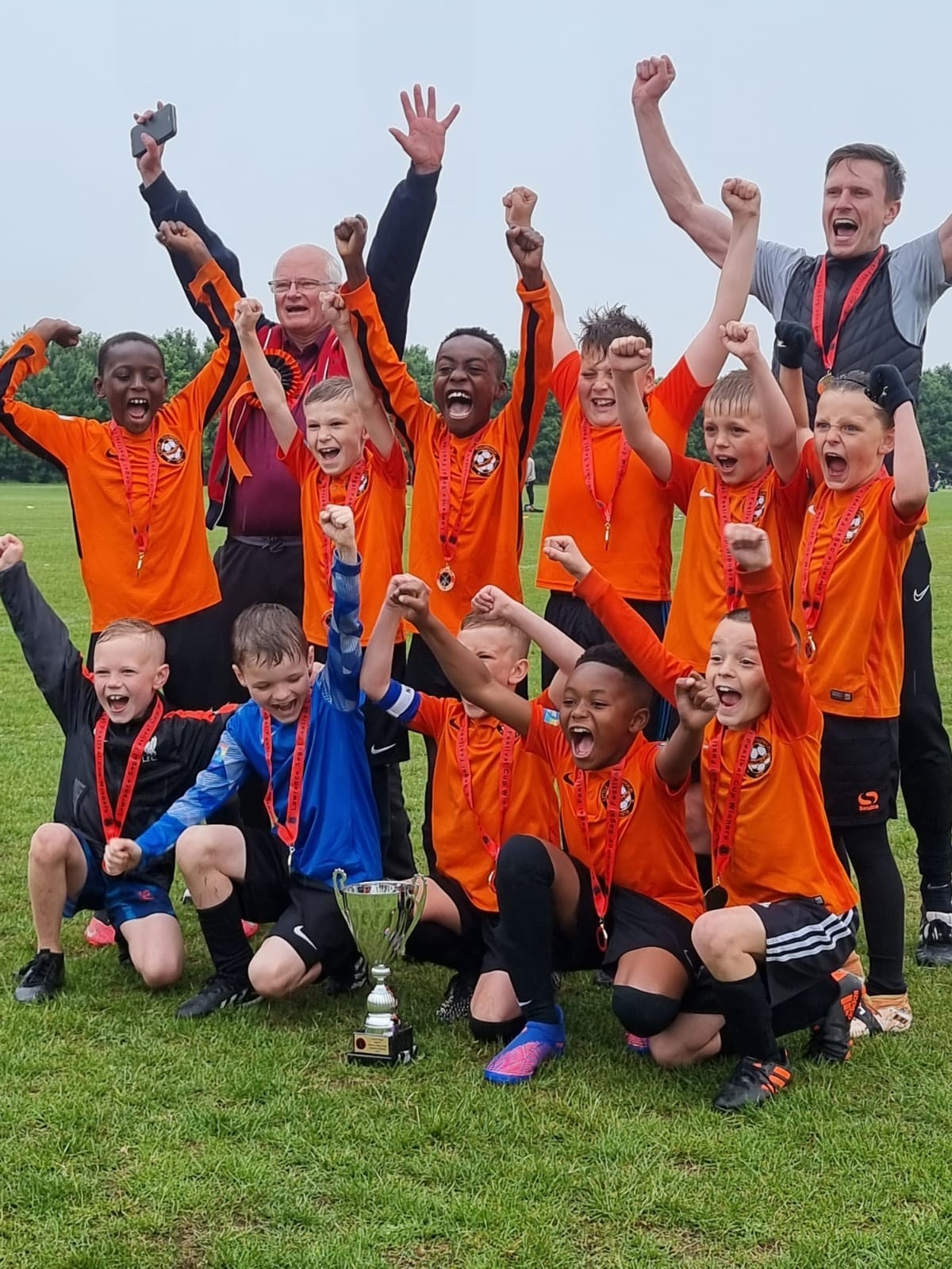 Little Thurrock Dynamos under 9's cup winning team celebrating