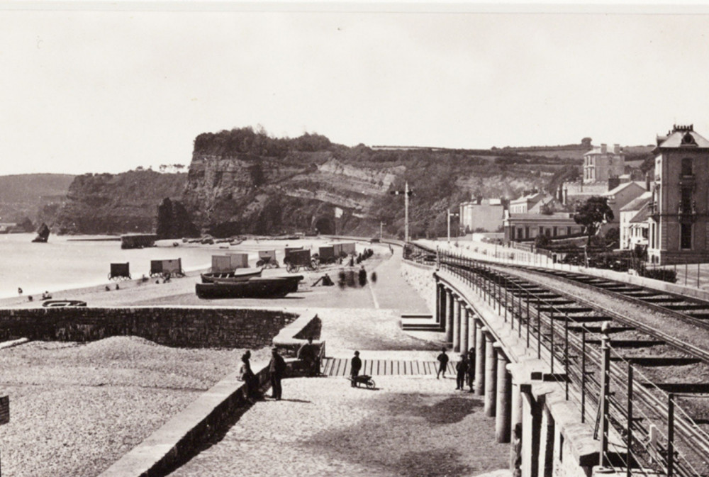 Photo of railway with bathing machines on beach c.1875 (By National Media Museum from UK, https://commons.wikimedia.org/w/index.php?curid=30445349)