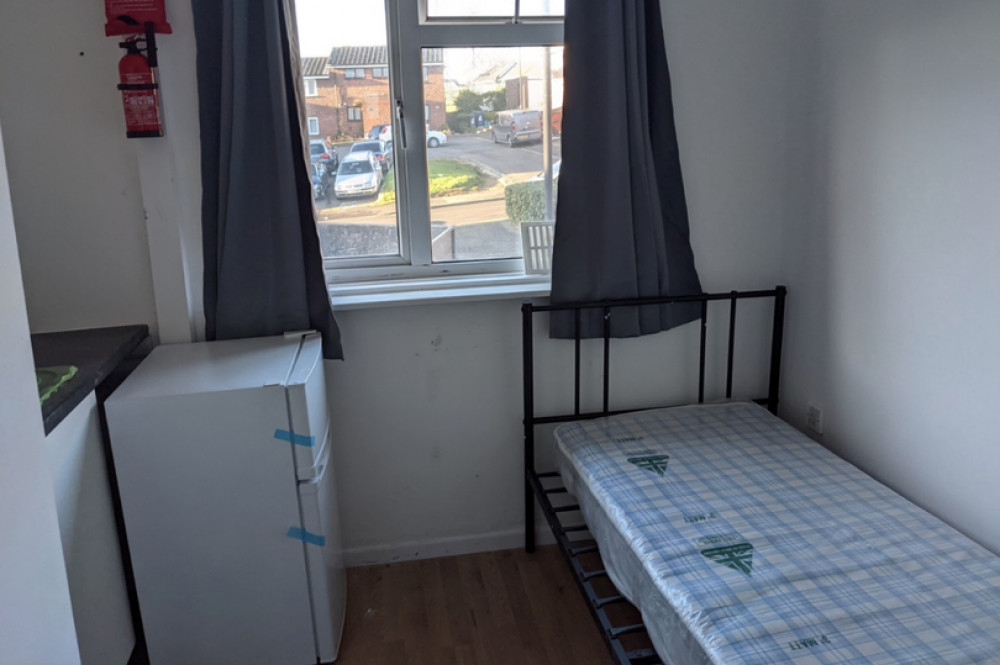 The studio flat in Northolt can fit a single bed - if it's put in the kitchen (Image: OpenRent)