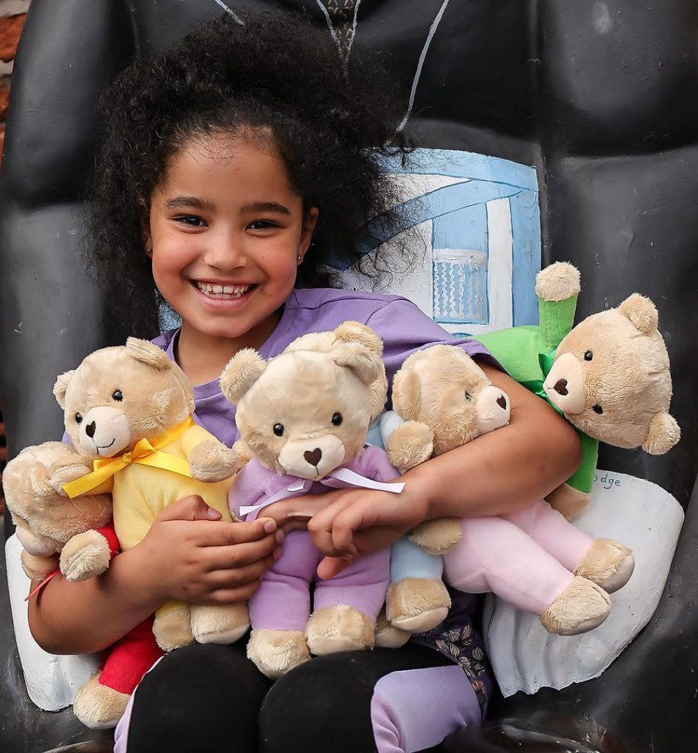 The smiling face of TLC . . . Jainaba Barratt at the teddy bears' photo shoot (Picture: Bob Howell)