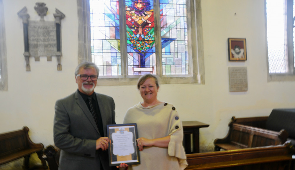 Hadleigh cricket club's Claire Levitt receives award from mayor Gordon McLeod (Picture credit: Hadleigh Nub News)