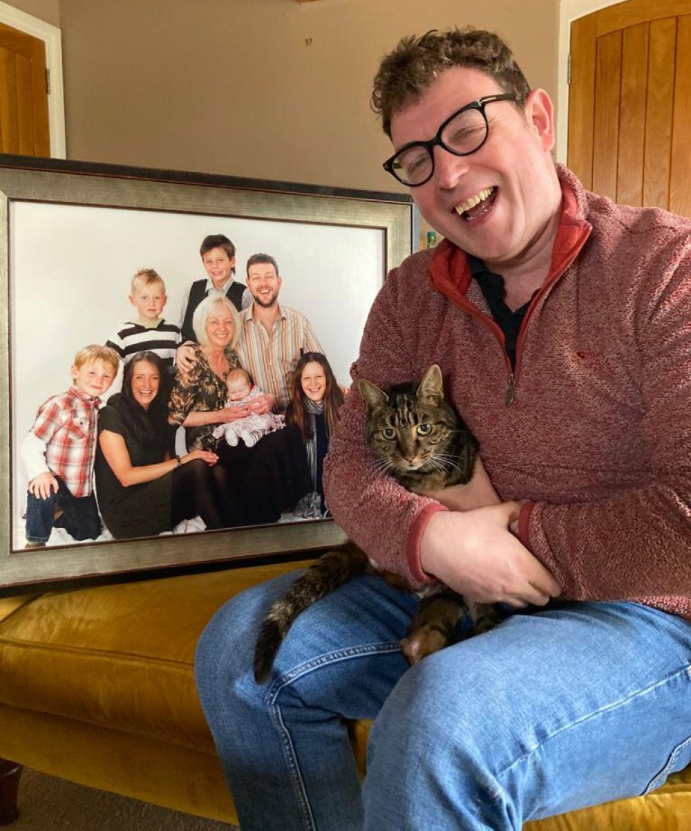 Simon Cunningham has adopted his late mother's cat who was rescued by the RSPCA (Picture: RSPCA)