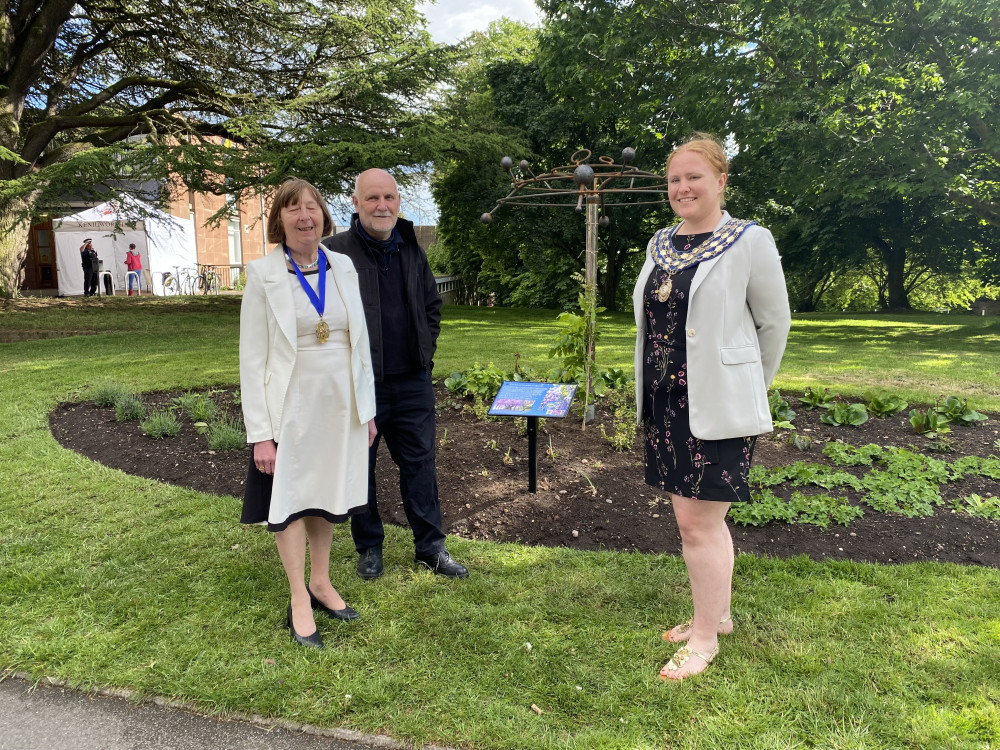 The memorial, designed by John Holmes (centre) was unveiled by Cllr Sidney Syson (left) and Cllr Sam Cooke yesterday