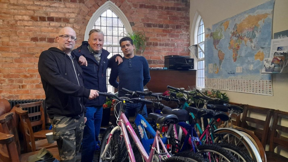 Ben Wye (centre) has organised a bike donation scheme at Hope Church.