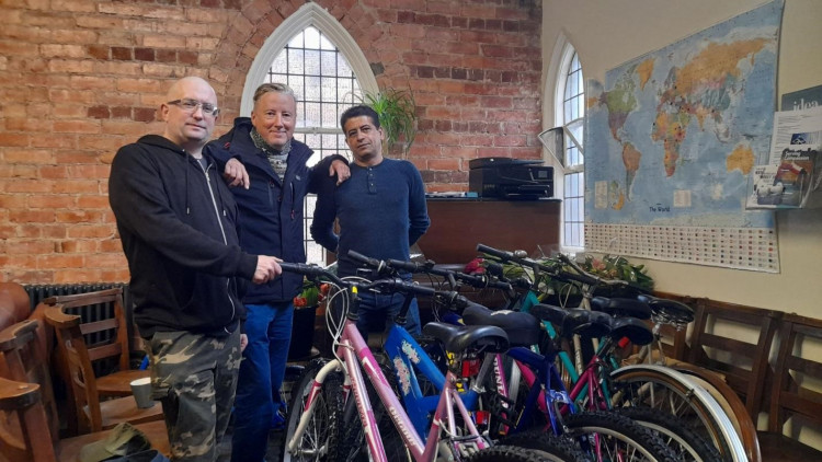 Ben Wye (centre) has organised a bike donation scheme at Hope Church.