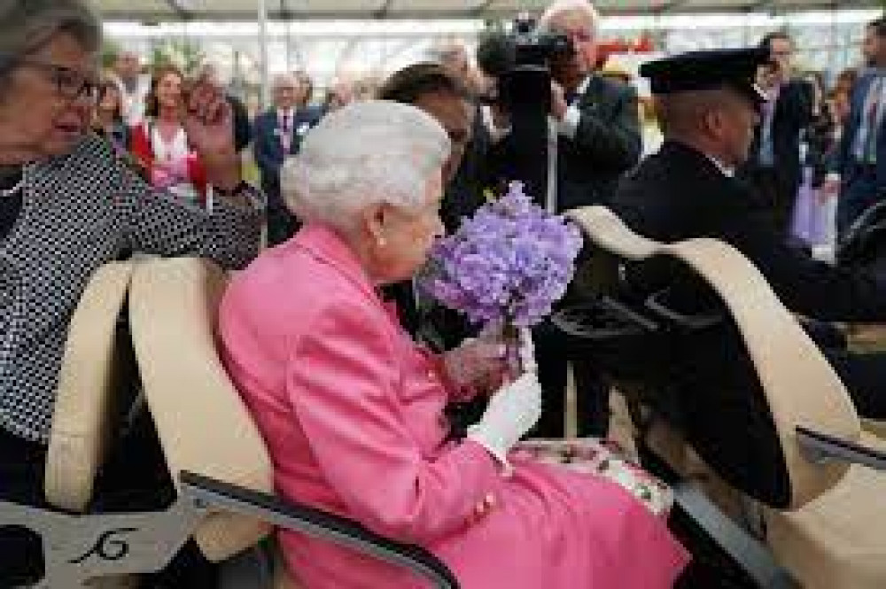 The Queen enjoyed the scent of Sweet Peas grown in Harkstead (Picture contributed) 