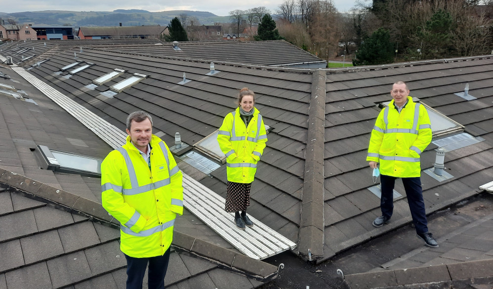 UP ON THE ROOF: Macclesfield Hospital's Rob Few (Associate Director of Estates and Facilities), Sarah Bloor (Asset and Sustainability Manager) and Alan Hough (Head of Estates Operations). (Image - East Cheshire NHS Trust)