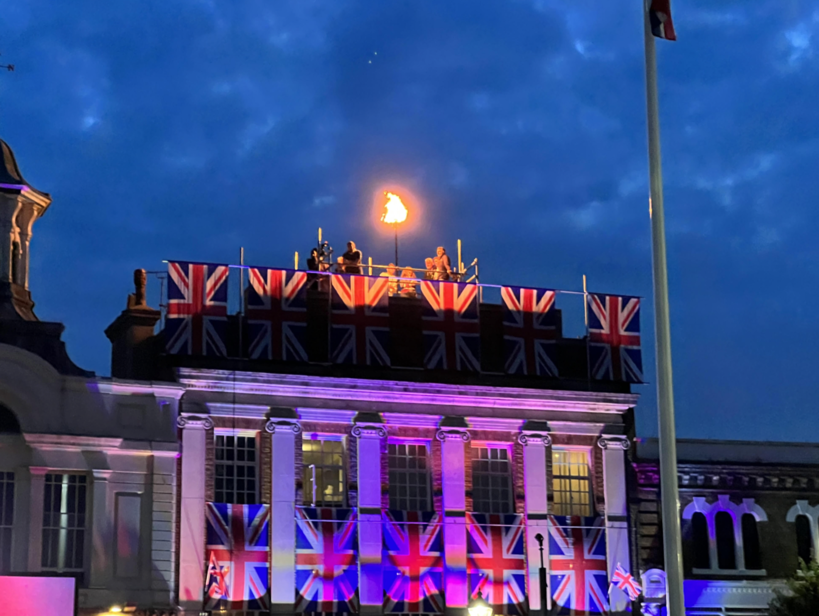 A beacon was lit at Hitchin Market Place to mark the Queen's Platinum Jubilee. CREDIT: @HitchinNubNews