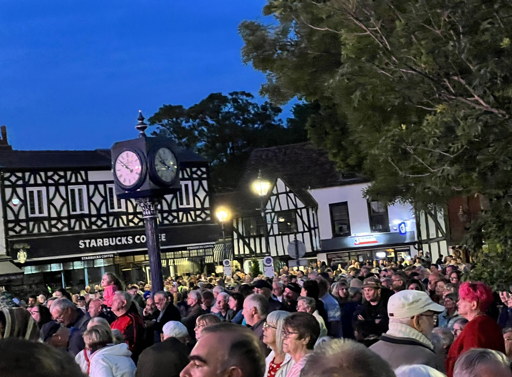 A large crowd gathered in Hitchin Town centre to mark the Queen's Platinum Jubilee on Thursday evening. CREDIT: @HitchinNubNews 