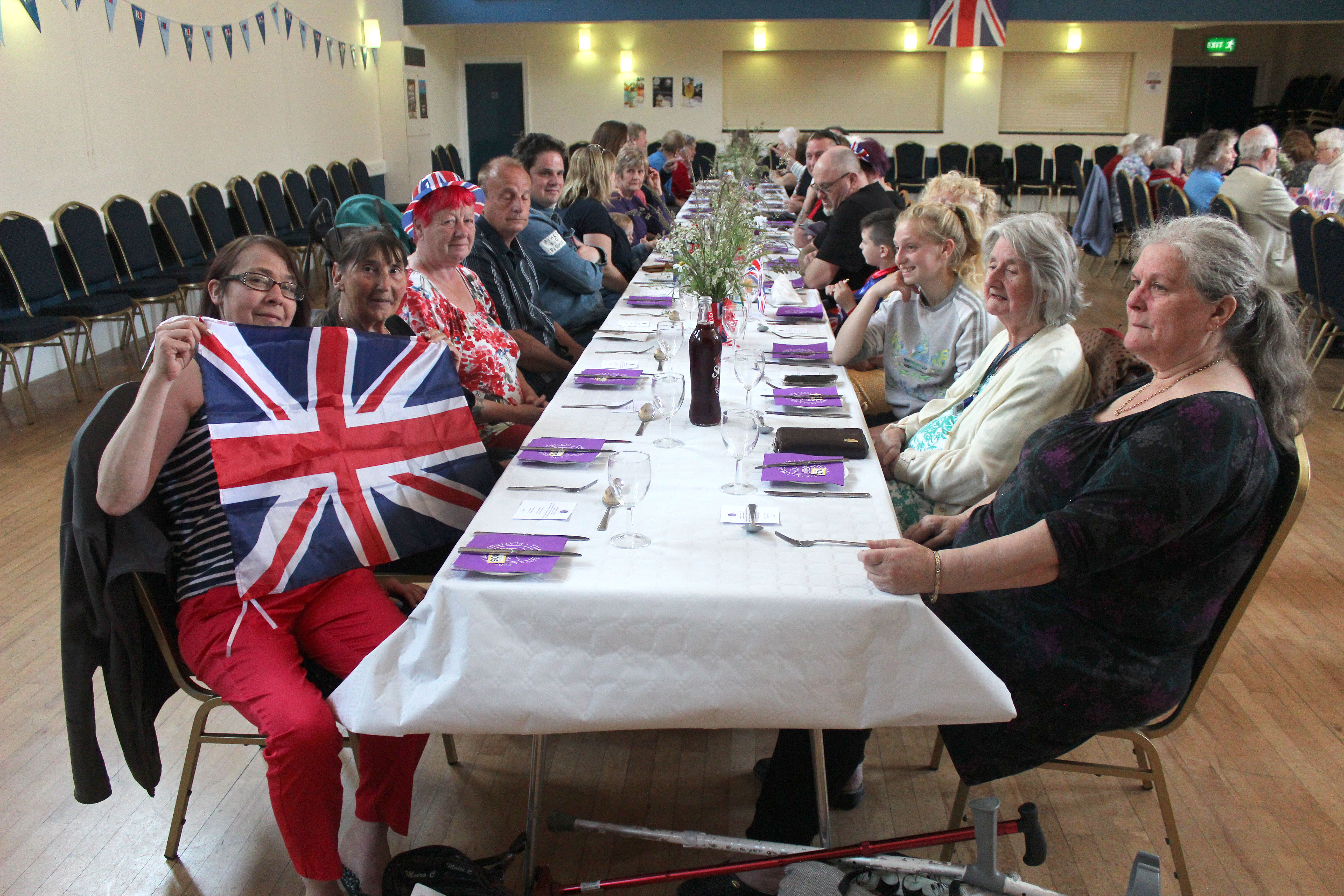 Axminster residents enjoy Nourish's jubilee lunch at the Guildhall