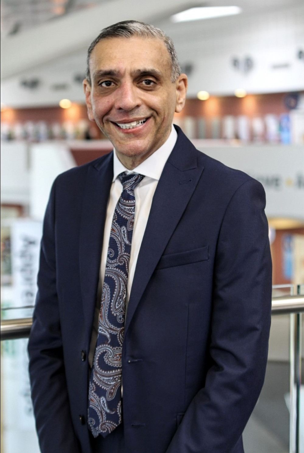 Principal and CEO of Cheshire College - South & West, Dhesi, has been awarded the OBE for services to education (Cheshire College - South & West).