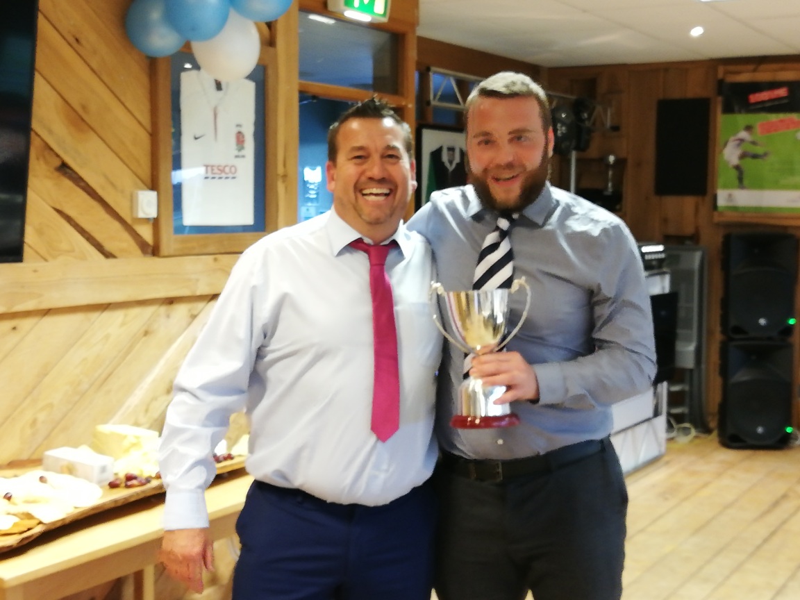 Nathan Herbert receiving The Brett Chant Cup for Supporters Player of the Year