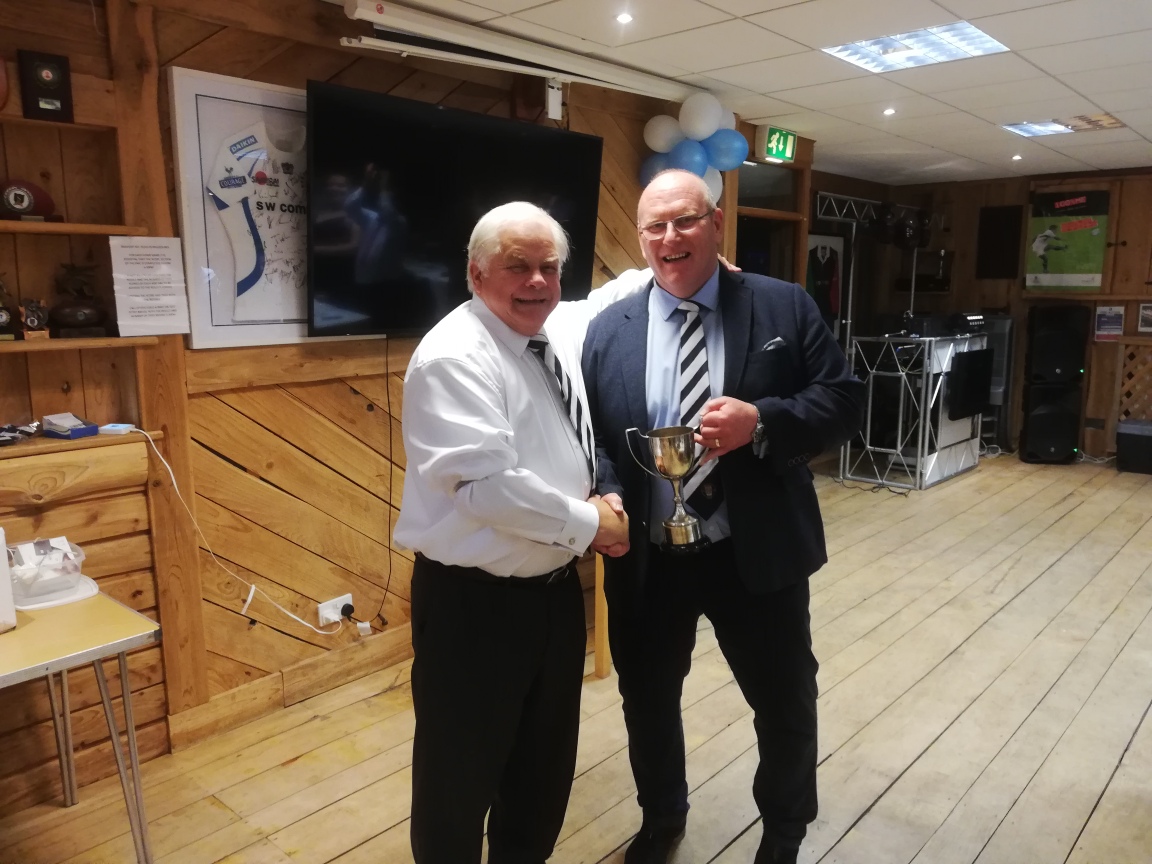 Noel Gregory receiving Clubman of the Year from Chairman Julian Hussey