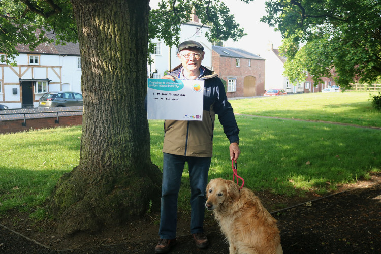 Cllr Alan Rhead with his pledge to walk more with his dog, Molly (Image supplied)