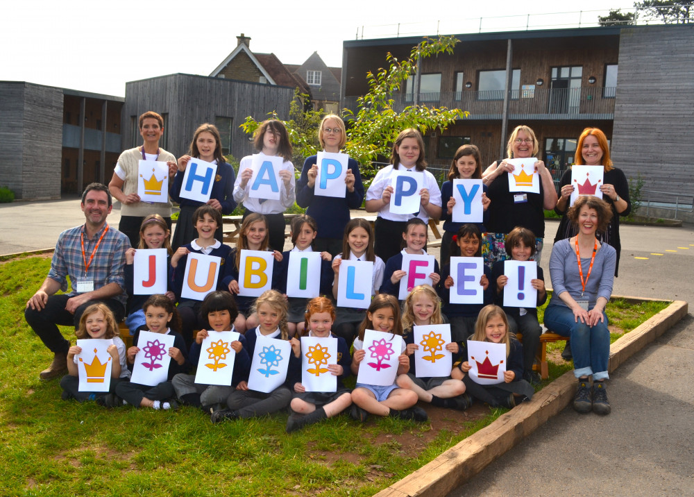 The adults in the photo from top left to bottom right: Abby Atkins - Principal, Alison Armstrong - Personal Development Lead, Sakara Vitellaro - Deputy Principal, Jim Hallybone PTFA member and Jenn Connor PTFA Secretary. The children are all members of the Avanti Park School Council.